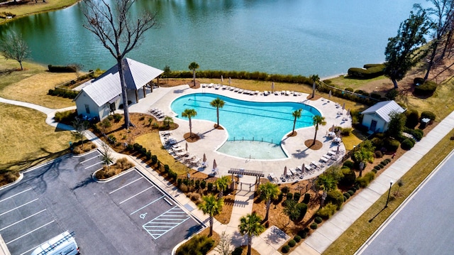 birds eye view of property featuring a water view