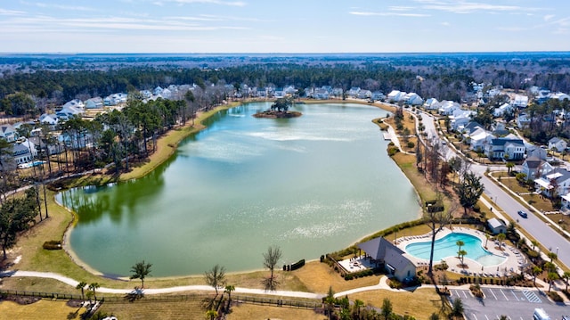 bird's eye view with a residential view and a water view