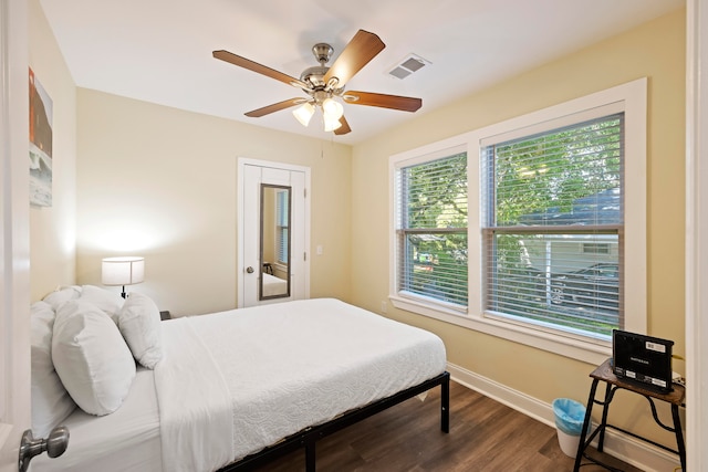 bedroom featuring ceiling fan and hardwood / wood-style flooring