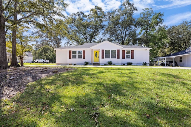 ranch-style home featuring a front yard