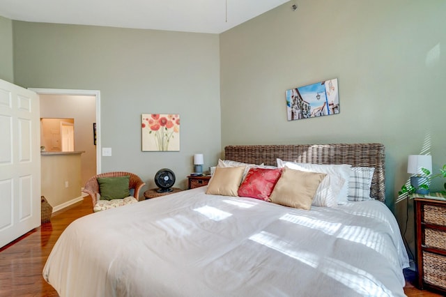bedroom featuring wood finished floors