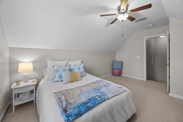 carpeted bedroom featuring vaulted ceiling, a ceiling fan, visible vents, and baseboards