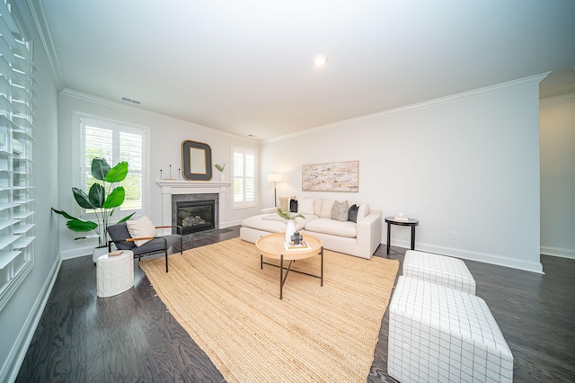 living room featuring dark hardwood / wood-style flooring and crown molding