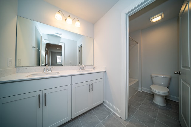 full bathroom with vanity, toilet, washtub / shower combination, and tile patterned flooring