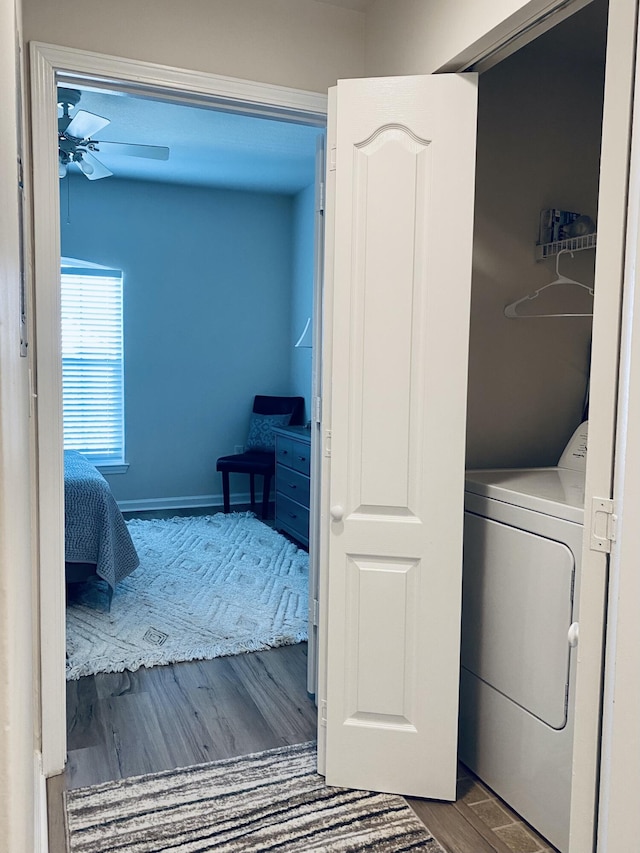 clothes washing area featuring washer / dryer, hardwood / wood-style floors, and ceiling fan