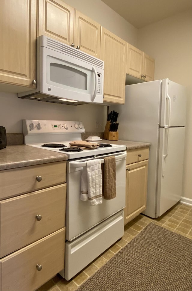 kitchen featuring white appliances