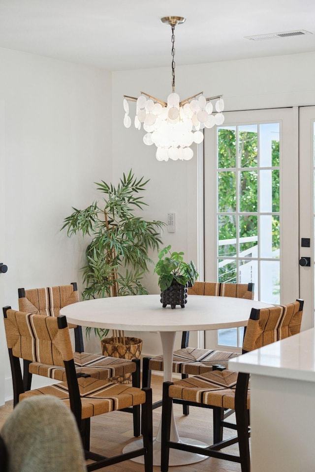 521 Carpenter St, Charleston, SC 29412 - dining room with a chandelier