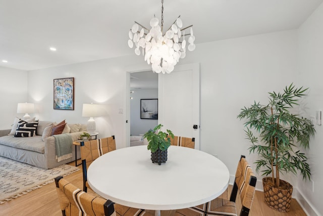 521 Carpenter St, Charleston, SC 29412 - dining space with wood finished floors, a chandelier, and recessed lighting