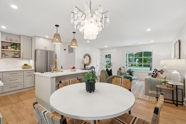 521 Carpenter St, Charleston, SC 29412 - dining room with recessed lighting and light wood-type flooring