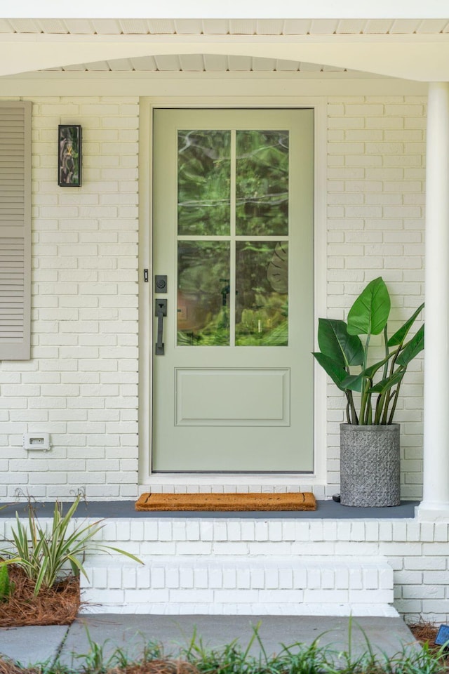 521 Carpenter St, Charleston, SC 29412 - entrance to property featuring covered porch and brick siding