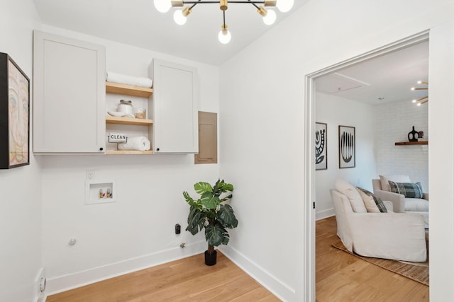 521 Carpenter St, Charleston, SC 29412 - washroom with attic access, gas dryer hookup, and light wood-style flooring
