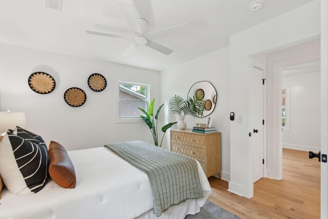 521 Carpenter St, Charleston, SC 29412 - bedroom with light wood-type flooring, baseboards, and a ceiling fan