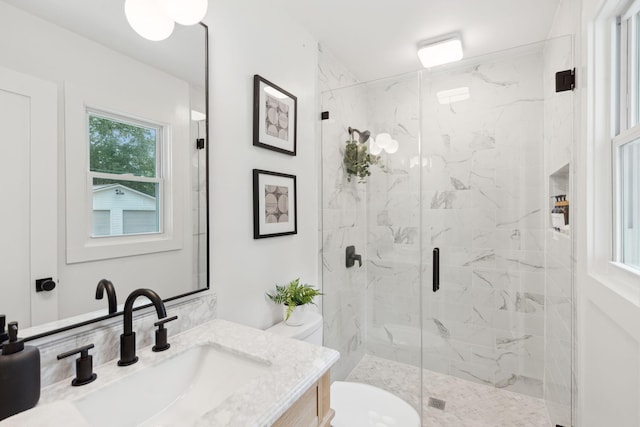 521 Carpenter St, Charleston, SC 29412 - full bathroom with toilet, a marble finish shower, and vanity