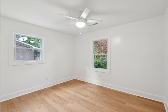 521 Carpenter St, Charleston, SC 29412 - empty room featuring light wood finished floors, baseboards, and ceiling fan