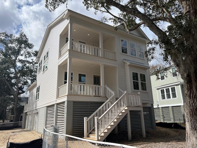 rear view of house with a balcony