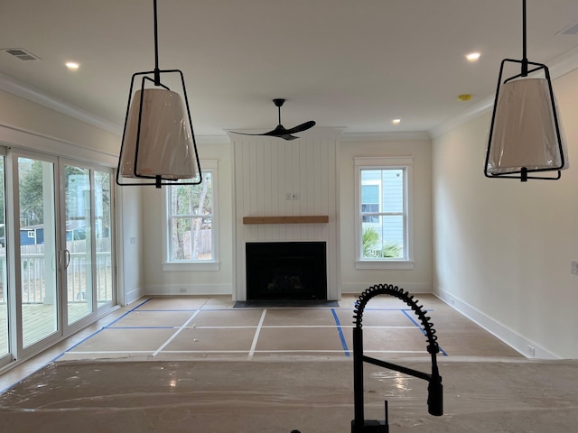 unfurnished living room featuring ornamental molding and a fireplace