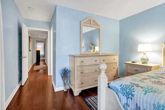 bedroom featuring dark wood-type flooring