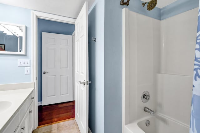 bathroom with vanity, tile patterned floors, and shower / bath combination with curtain