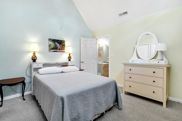 bedroom featuring high vaulted ceiling and light colored carpet