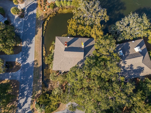 bird's eye view with a water view