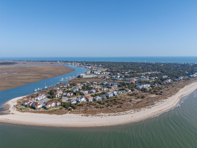 aerial view featuring a water view and a view of the beach