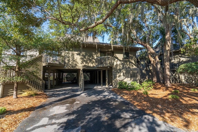 view of front of house featuring a carport