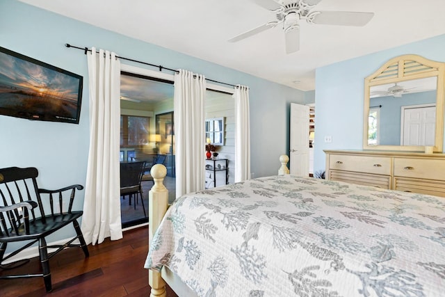 bedroom with access to exterior, dark wood-type flooring, and ceiling fan