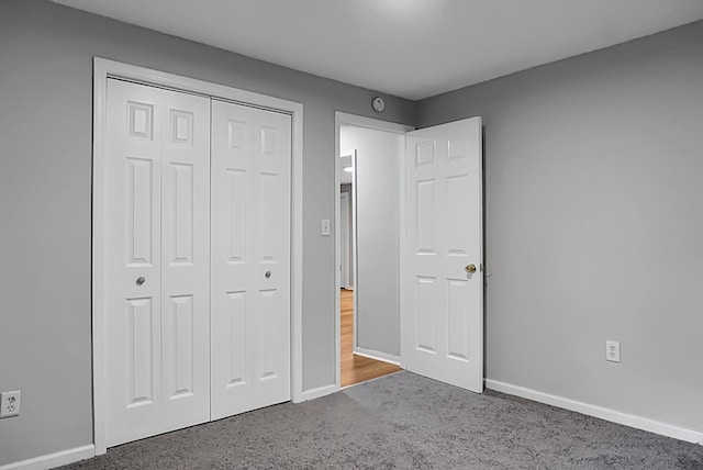 5056 Piedmont Ave, North Charleston, SC 29406 - unfurnished bedroom with carpet floors, baseboards, and a closet