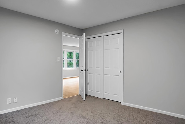 5056 Piedmont Ave, North Charleston, SC 29406 - unfurnished bedroom with carpet floors, baseboards, and a closet