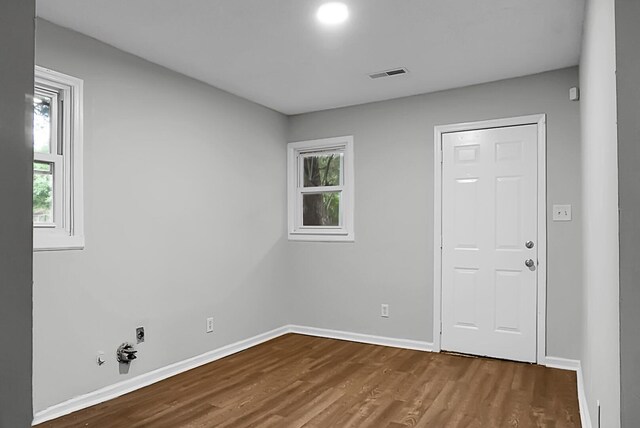 5056 Piedmont Ave, North Charleston, SC 29406 - unfurnished room with baseboards and dark wood-type flooring