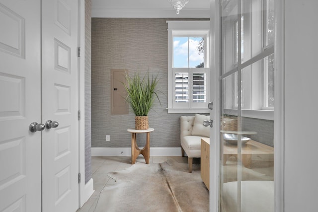 bathroom featuring baseboards and wallpapered walls