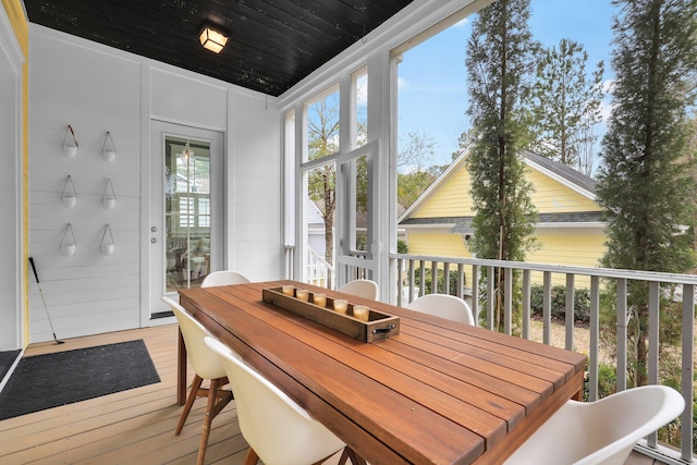 sunroom with wood ceiling