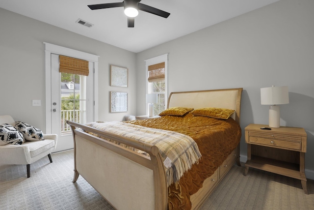 bedroom featuring ceiling fan, light carpet, visible vents, baseboards, and access to outside