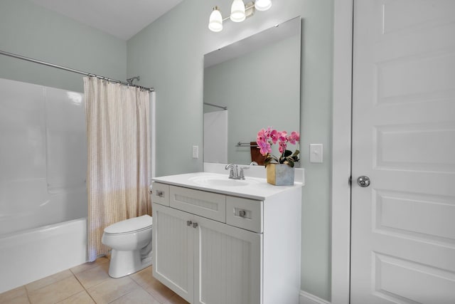 full bathroom featuring toilet, tile patterned flooring, shower / bath combo with shower curtain, and vanity