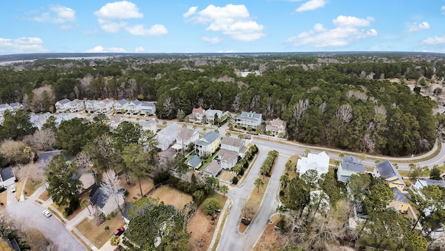 aerial view with a forest view and a residential view