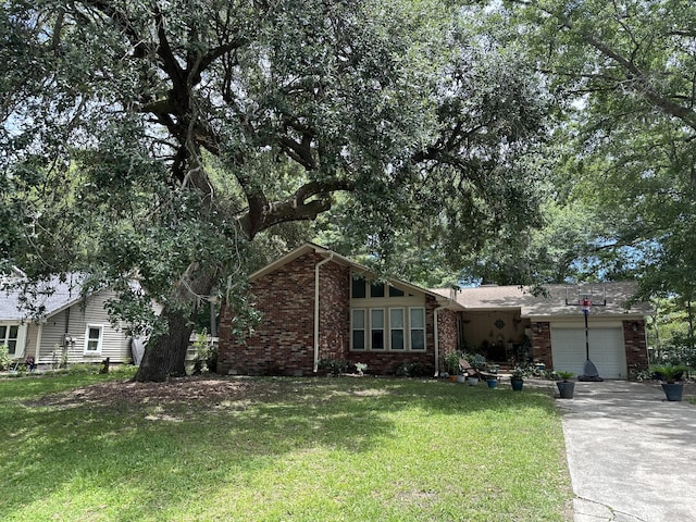 ranch-style home featuring a front yard and a garage