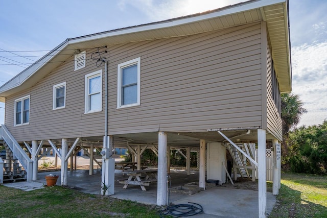 rear view of property featuring a patio