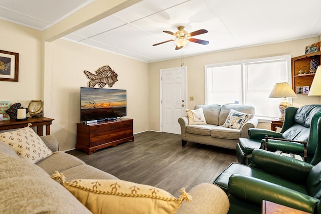 living room with crown molding, dark hardwood / wood-style floors, and ceiling fan