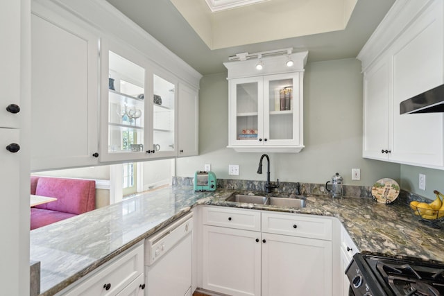 kitchen with sink, dishwasher, white cabinets, and range