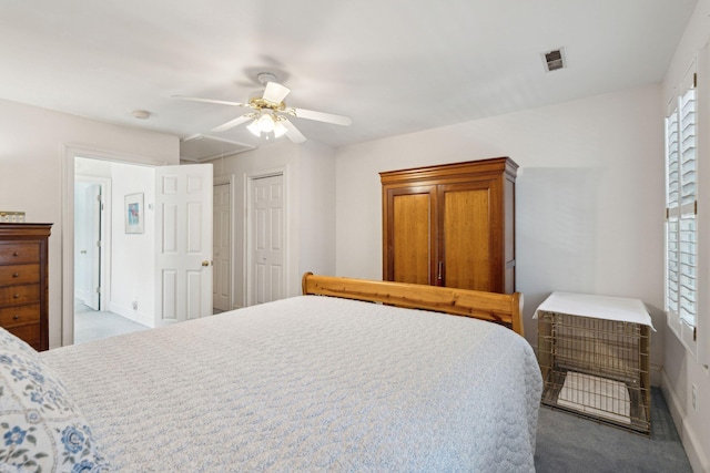 bedroom with light carpet, multiple windows, and ceiling fan