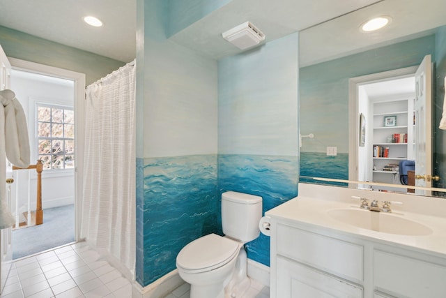 bathroom featuring built in shelves, tile patterned floors, toilet, and vanity