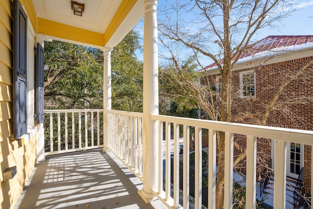 balcony featuring a porch