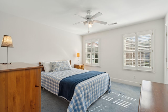 carpeted bedroom with ceiling fan