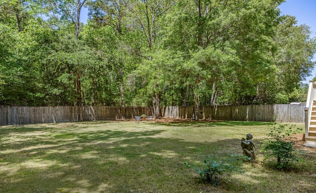 view of yard featuring a fenced backyard