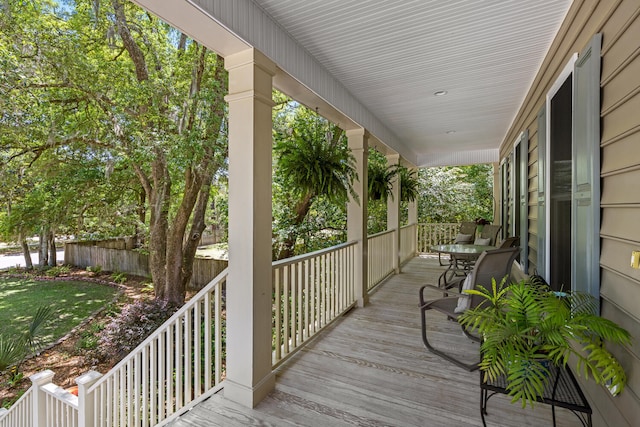 wooden deck featuring covered porch