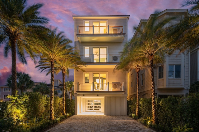 view of front of house with a balcony