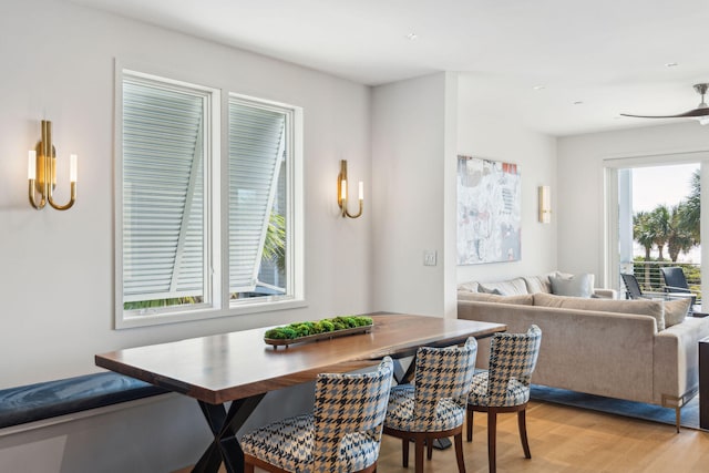 dining room with breakfast area and light wood-type flooring