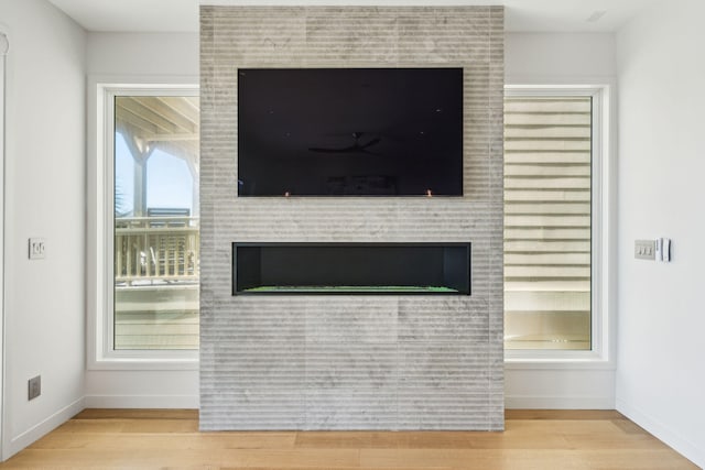 unfurnished living room featuring light hardwood / wood-style flooring