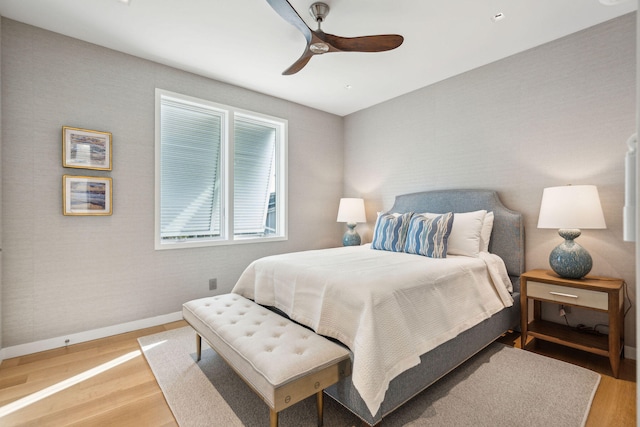 bedroom featuring wood-type flooring and ceiling fan