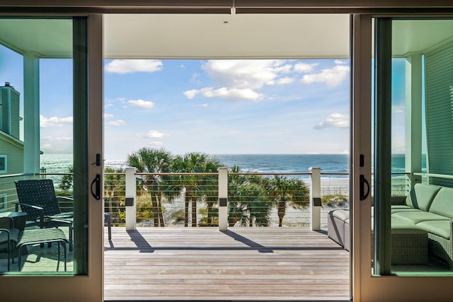 balcony featuring a water view